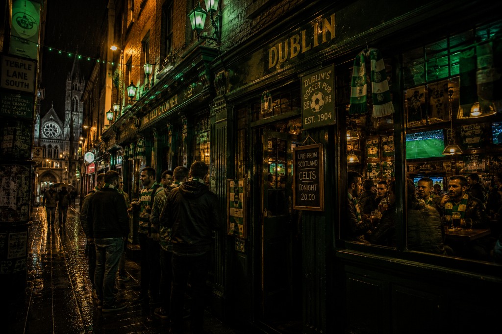 Celtic pub exterior with supporters gathering outside